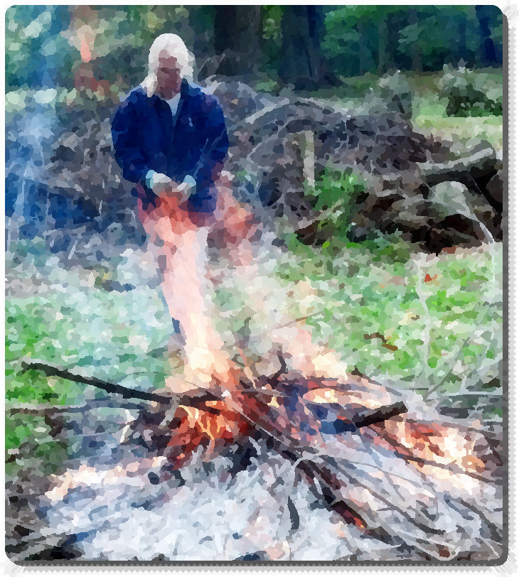 feeding a fire on autumn afternoon